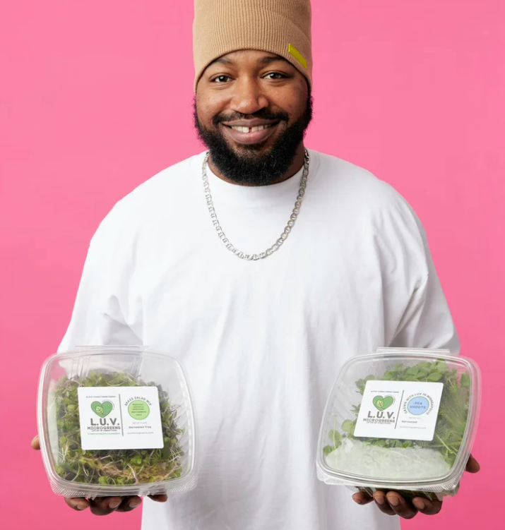 L.U.V. Microgreens, founder of L.U.V. Microgreens in Saint Paul, at work